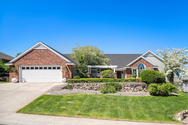 176 Marine View Dr, Lewiston, ID 83501 - view of front facade featuring brick siding, driveway, and a front yard