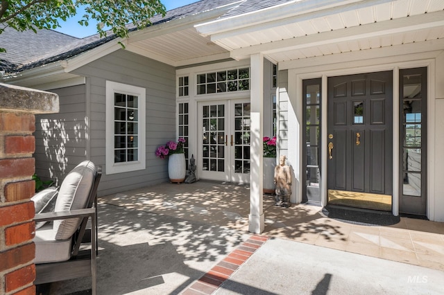 176 Marine View Dr, Lewiston, ID 83501 - property entrance featuring french doors, roof with shingles, and a patio