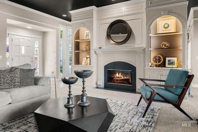 176 Marine View Dr, Lewiston, ID 83501 - living room with built in features, a fireplace with flush hearth, baseboards, recessed lighting, and crown molding