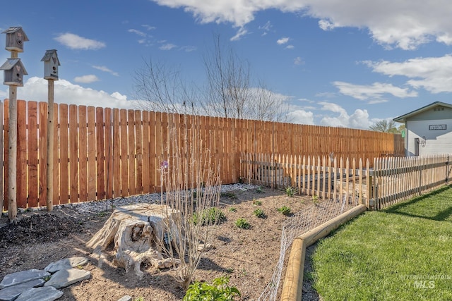 view of yard featuring fence