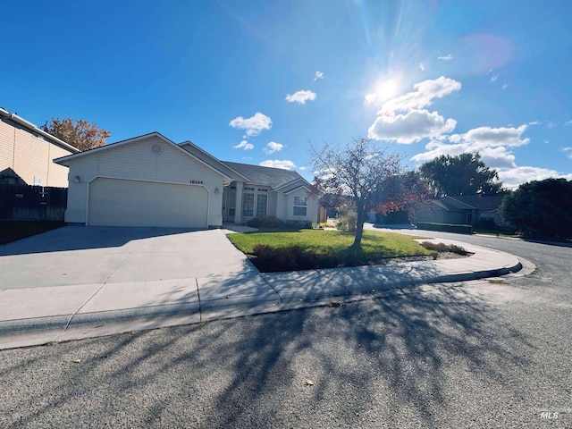 18194 Saffron, Nampa, ID 83687 - single story home featuring a garage, driveway, and a front lawn