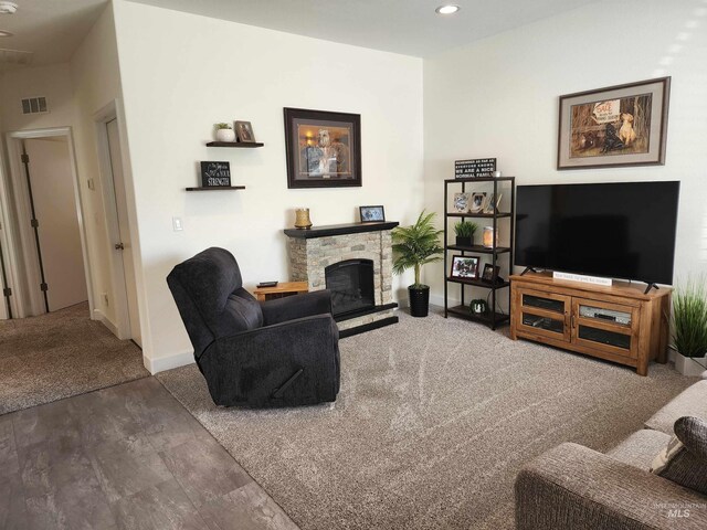 1018 S Washington Ave, Emmett, ID 83617 - living room with carpet floors and a stone fireplace