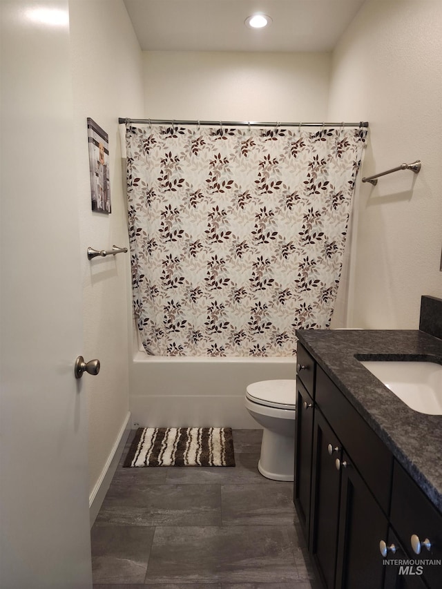 1018 S Washington Ave, Emmett, ID 83617 - full bathroom featuring vanity, shower / bath combination with curtain, and toilet