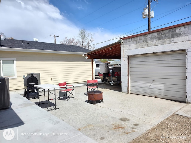 1018 S Washington Ave, Emmett, ID 83617 - garage featuring central air condition unit