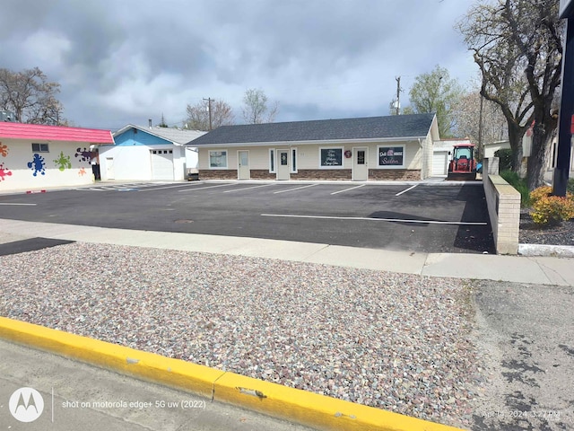 1018 S Washington Ave, Emmett, ID 83617 - view of vehicle parking with a garage