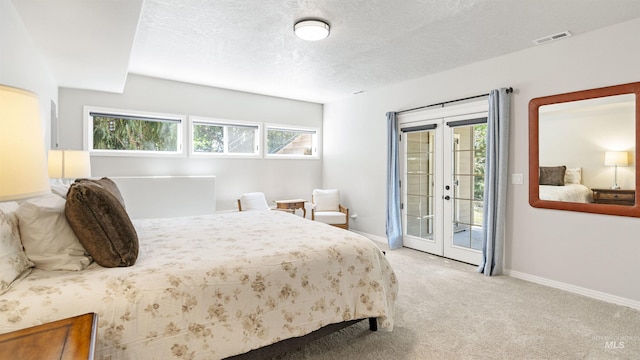 carpeted bedroom featuring access to exterior, french doors, baseboards, and a textured ceiling