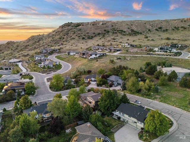 aerial view at dusk of a mountain view and a residential view
