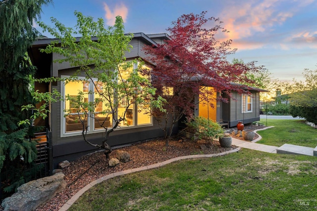view of front of home with a front lawn