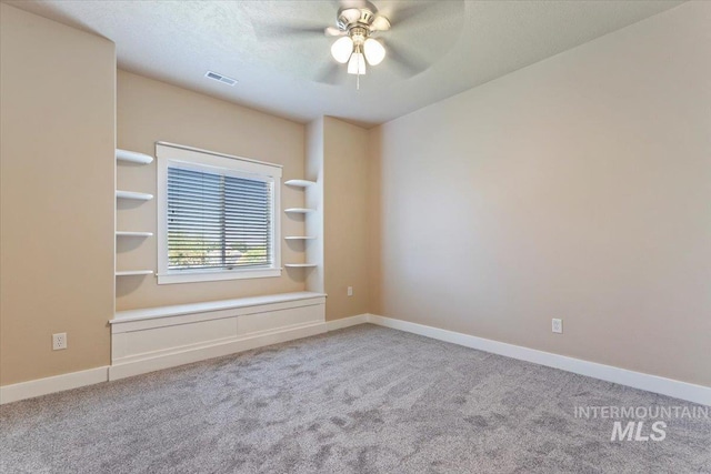 1112 W Belknap Dr, Nampa, ID 83686 - carpeted empty room featuring a ceiling fan and a textured ceiling