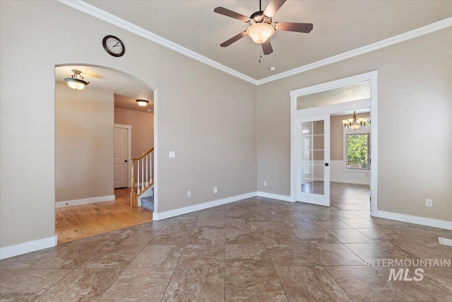 1112 W Belknap Dr, Nampa, ID 83686 - empty room with ornamental molding, arched walkways, stairs, a ceiling fan, and a chandelier