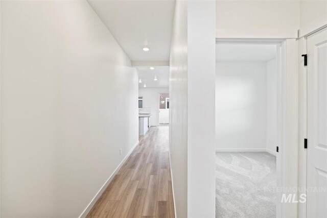 hall featuring light hardwood / wood-style floors