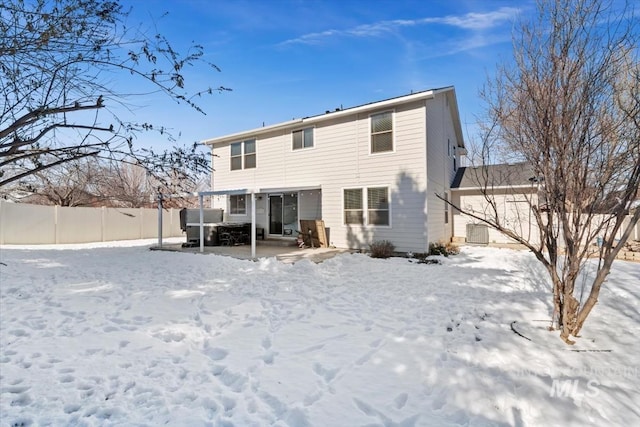 view of snow covered house