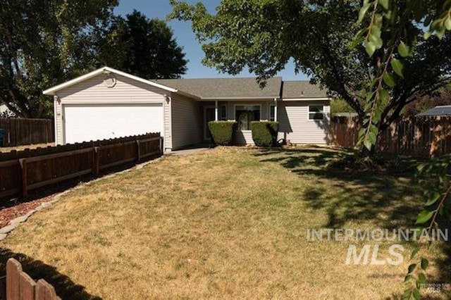 ranch-style house with a front yard and a garage