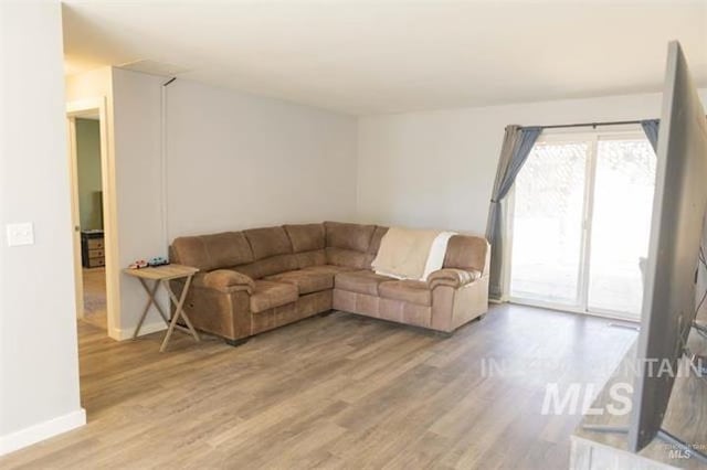 living room with hardwood / wood-style flooring