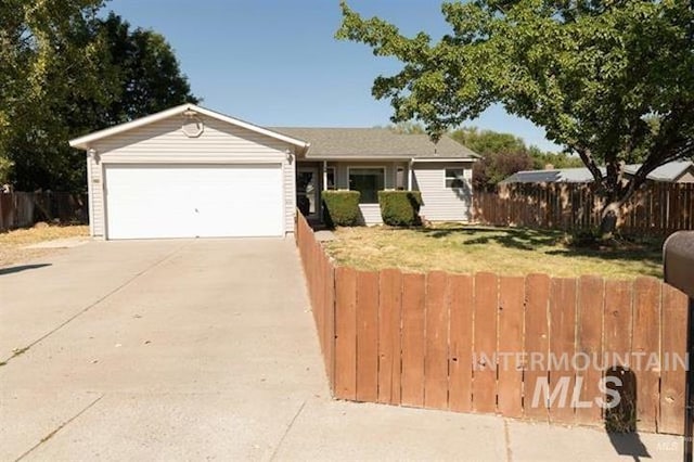 ranch-style home with a garage