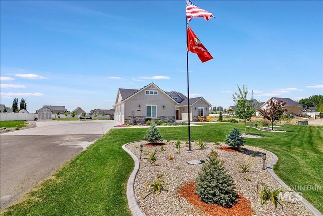 3492 E 3600 N, Kimberly, ID 83341 - craftsman house featuring driveway, board and batten siding, a front lawn, stone siding, and a residential view
