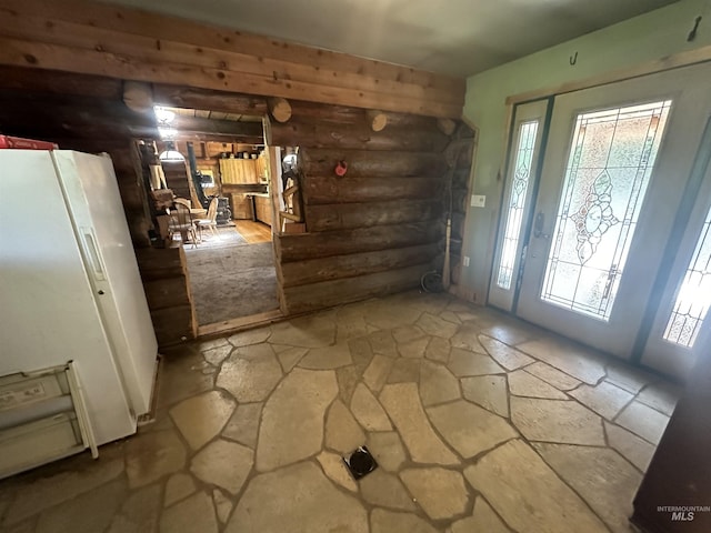 2223 Glenwood Rd, Kamiah, ID 83536 - entrance foyer with a wealth of natural light, stone floors, and rustic walls