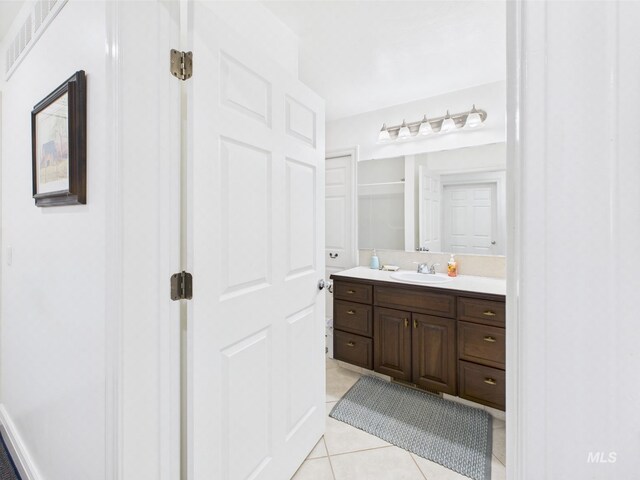 11 N 3rd W, St, Paul, ID 83347 - bathroom with tile patterned floors and vanity