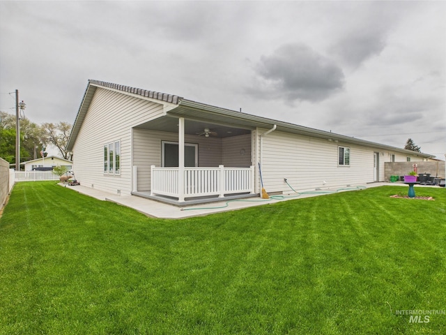11 N 3rd W, St, Paul, ID 83347 - rear view of house featuring a ceiling fan and a patio area