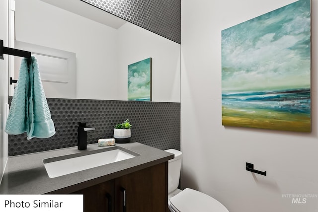 TBD N Kimball St, Boise, ID 83704 - bathroom with backsplash, toilet, and vanity