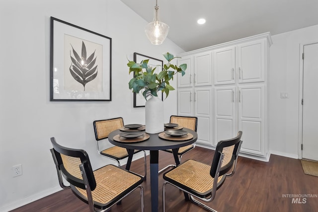 dining area featuring dark hardwood / wood-style floors