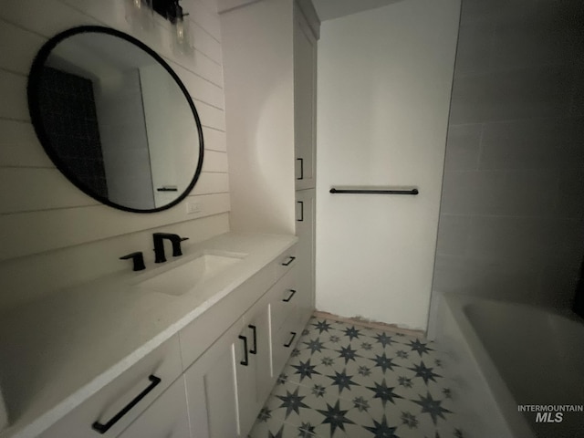 3915 N Abbott St, Caldwell, ID 83607 - bathroom featuring tile patterned floors, vanity, a bath, and a shower