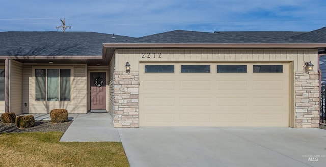 single story home featuring a garage