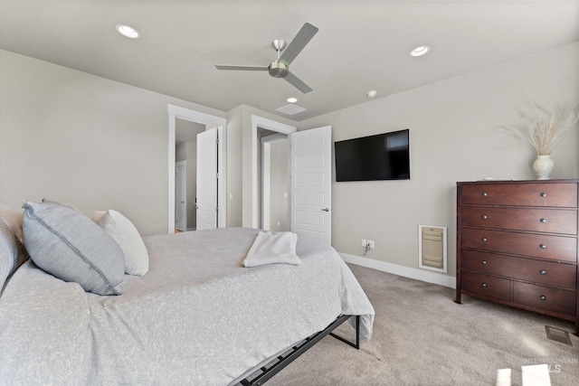 bedroom featuring light carpet, ceiling fan, baseboards, and recessed lighting