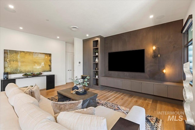 1112 W Main St Unit 503, Boise, ID 83702 - living room with recessed lighting, light wood-style floors, and built in features