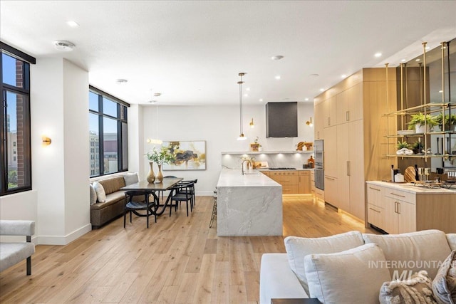 1112 W Main St Unit 503, Boise, ID 83702 - living room featuring light wood-type flooring and recessed lighting