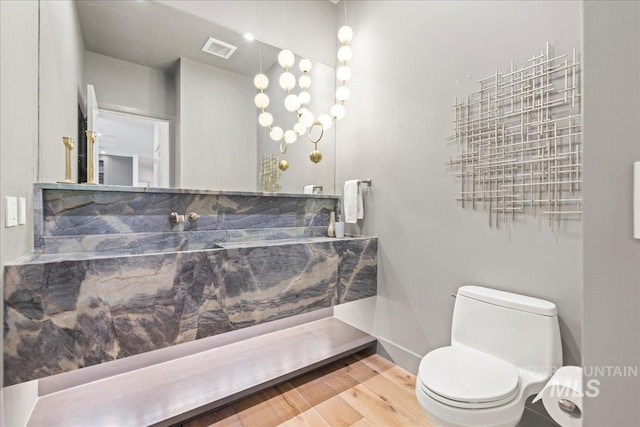 1112 W Main St Unit 503, Boise, ID 83702 - bathroom featuring wood finished floors and vanity