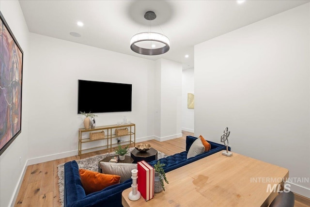 1112 W Main St Unit 503, Boise, ID 83702 - living area featuring wood finished floors and recessed lighting