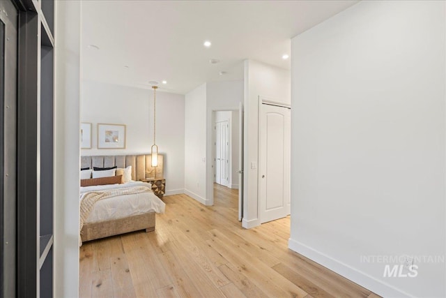 1112 W Main St Unit 503, Boise, ID 83702 - bedroom featuring light wood-type flooring and recessed lighting