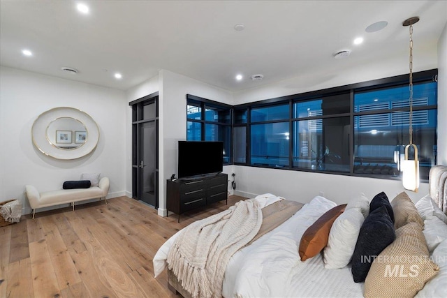 1112 W Main St Unit 503, Boise, ID 83702 - bedroom featuring wood finished floors and recessed lighting