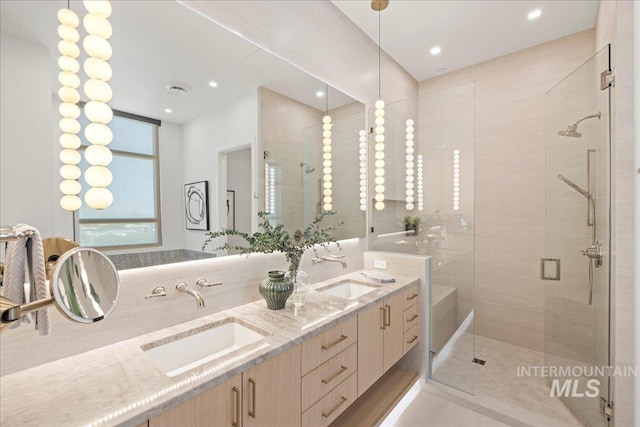 1112 W Main St Unit 503, Boise, ID 83702 - full bathroom featuring a shower stall, double vanity, recessed lighting, and a bathtub