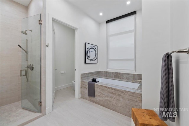 1112 W Main St Unit 503, Boise, ID 83702 - full bath with a shower stall, a bath, tile patterned flooring, and recessed lighting