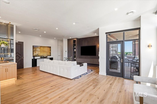 1112 W Main St Unit 503, Boise, ID 83702 - living area featuring light wood-style floors and recessed lighting
