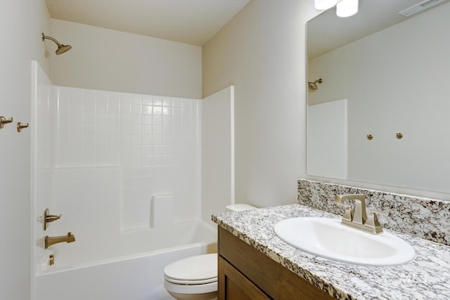 bathroom featuring toilet, visible vents, washtub / shower combination, and vanity