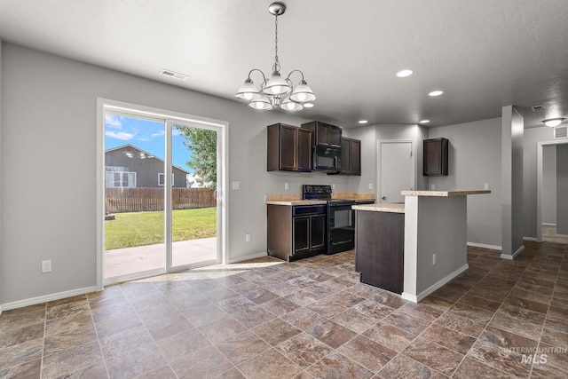 10619 Tysen Springs St, Nampa, ID 83687 - kitchen featuring black appliances, baseboards, dark brown cabinets, stone finish flooring, and recessed lighting