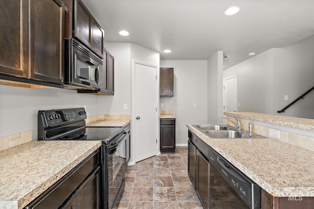 10619 Tysen Springs St, Nampa, ID 83687 - kitchen with black appliances, a sink, dark brown cabinetry, and recessed lighting