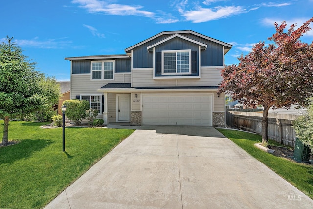 10619 Tysen Springs St, Nampa, ID 83687 - view of front of property featuring board and batten siding, an attached garage, and driveway
