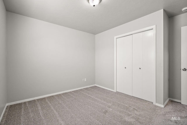 10619 Tysen Springs St, Nampa, ID 83687 - unfurnished bedroom with carpet floors, baseboards, and a closet