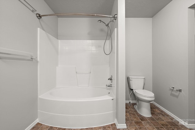 10619 Tysen Springs St, Nampa, ID 83687 - bathroom featuring toilet, washtub / shower combination, and baseboards