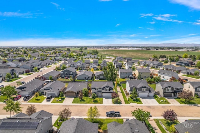 10619 Tysen Springs St, Nampa, ID 83687 - aerial perspective of suburban area featuring a mountain backdrop