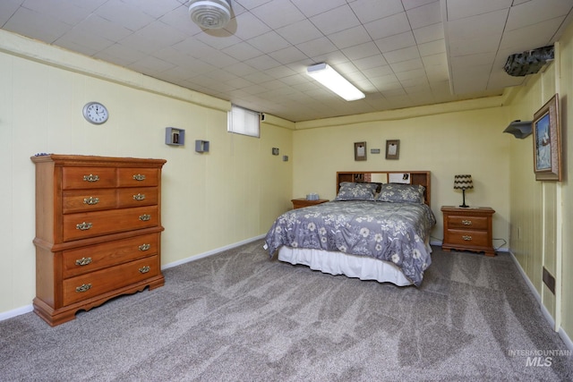 carpeted bedroom with baseboards