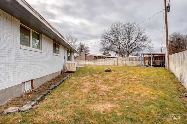 view of yard featuring a fenced backyard