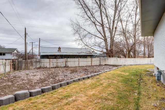 view of yard featuring a fenced backyard