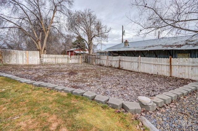 view of yard featuring a fenced backyard