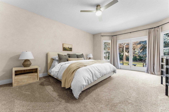 carpeted bedroom with ceiling fan and access to exterior