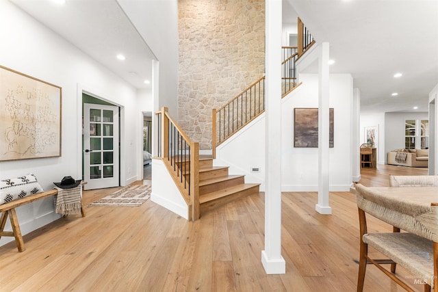 staircase featuring wood-type flooring